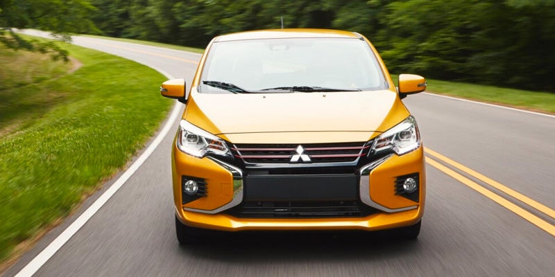 2024 Mitsubishi Mirage hatchback driving on road
